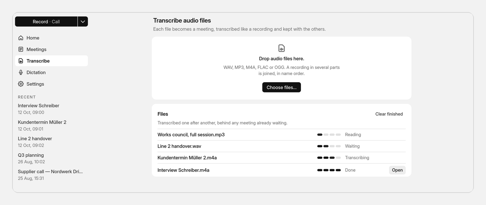 The Transcribe page with its drop zone and queue.